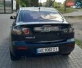 Черный Мазда 3, объемом двигателя 2 л и пробегом 187 тыс. км за 6400 $, фото 1 на Automoto.ua
