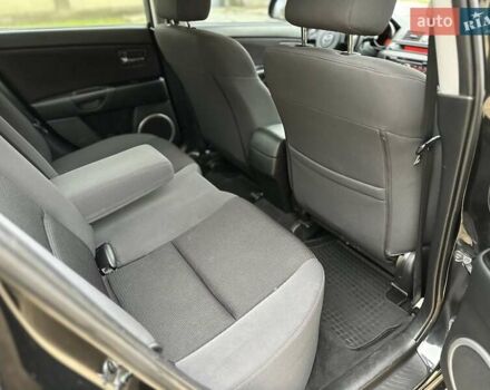 Черный Мазда 3, объемом двигателя 1.6 л и пробегом 130 тыс. км за 7700 $, фото 48 на Automoto.ua