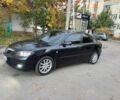 Черный Мазда 3, объемом двигателя 1.6 л и пробегом 185 тыс. км за 7750 $, фото 1 на Automoto.ua