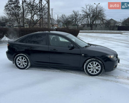 Чорний Мазда 3, об'ємом двигуна 1.6 л та пробігом 196 тис. км за 5500 $, фото 4 на Automoto.ua