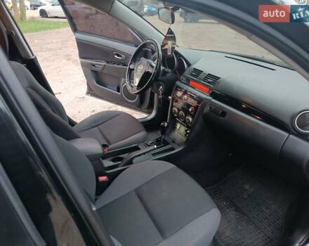 Черный Мазда 3, объемом двигателя 2 л и пробегом 221 тыс. км за 5700 $, фото 17 на Automoto.ua