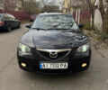 Черный Мазда 3, объемом двигателя 1.6 л и пробегом 255 тыс. км за 5650 $, фото 1 на Automoto.ua