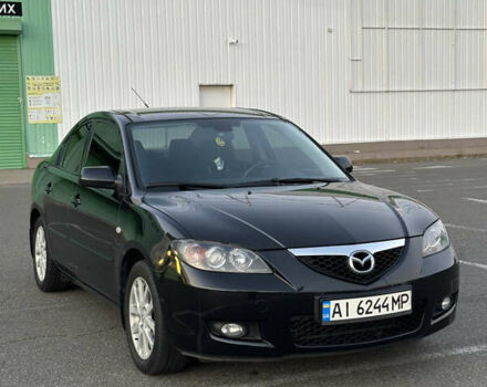 Черный Мазда 3, объемом двигателя 1.6 л и пробегом 225 тыс. км за 5900 $, фото 1 на Automoto.ua
