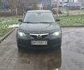 Черный Мазда 3, объемом двигателя 1.6 л и пробегом 205 тыс. км за 5600 $, фото 1 на Automoto.ua