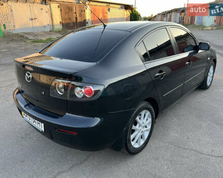 Чорний Мазда 3, об'ємом двигуна 2 л та пробігом 167 тис. км за 7500 $, фото 4 на Automoto.ua