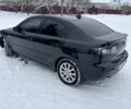 Чорний Мазда 3, об'ємом двигуна 1.6 л та пробігом 328 тис. км за 5700 $, фото 9 на Automoto.ua