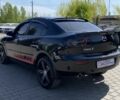 Чорний Мазда 3, об'ємом двигуна 2 л та пробігом 220 тис. км за 6999 $, фото 4 на Automoto.ua