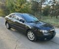 Черный Мазда 3, объемом двигателя 2 л и пробегом 192 тыс. км за 6500 $, фото 1 на Automoto.ua