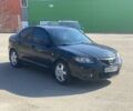 Черный Мазда 3, объемом двигателя 2 л и пробегом 258 тыс. км за 3350 $, фото 1 на Automoto.ua