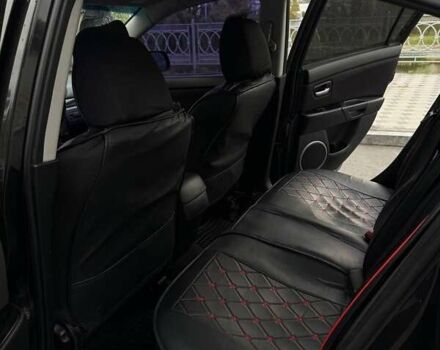 Черный Мазда 3, объемом двигателя 1.6 л и пробегом 253 тыс. км за 5400 $, фото 1 на Automoto.ua