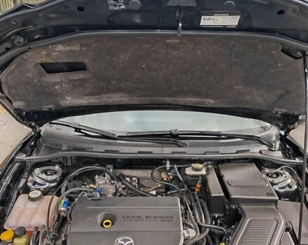 Черный Мазда 3, объемом двигателя 2 л и пробегом 199 тыс. км за 6800 $, фото 12 на Automoto.ua