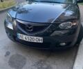 Черный Мазда 3, объемом двигателя 1.6 л и пробегом 305 тыс. км за 4000 $, фото 1 на Automoto.ua