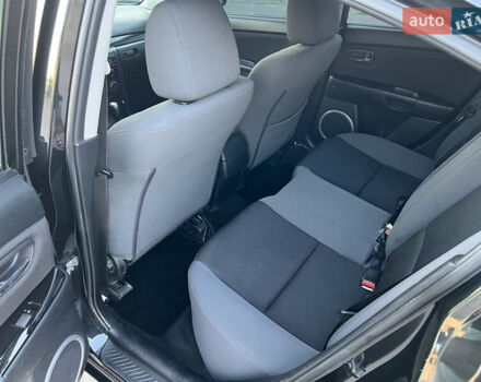 Чорний Мазда 3, об'ємом двигуна 2 л та пробігом 167 тис. км за 7500 $, фото 10 на Automoto.ua