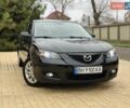 Черный Мазда 3, объемом двигателя 1.6 л и пробегом 130 тыс. км за 7700 $, фото 1 на Automoto.ua