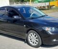 Черный Мазда 3, объемом двигателя 2 л и пробегом 187 тыс. км за 6400 $, фото 4 на Automoto.ua