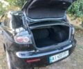 Черный Мазда 3, объемом двигателя 2 л и пробегом 247 тыс. км за 5800 $, фото 1 на Automoto.ua