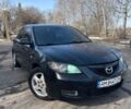 Черный Мазда 3, объемом двигателя 2 л и пробегом 220 тыс. км за 3650 $, фото 1 на Automoto.ua