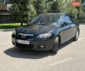 Черный Мазда 3, объемом двигателя 1.6 л и пробегом 207 тыс. км за 5800 $, фото 1 на Automoto.ua