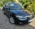 Черный Мазда 3, объемом двигателя 1.6 л и пробегом 170 тыс. км за 6200 $, фото 1 на Automoto.ua