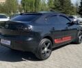 Чорний Мазда 3, об'ємом двигуна 2 л та пробігом 220 тис. км за 6999 $, фото 6 на Automoto.ua