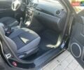 Черный Мазда 3, объемом двигателя 2 л и пробегом 175 тыс. км за 6000 $, фото 12 на Automoto.ua