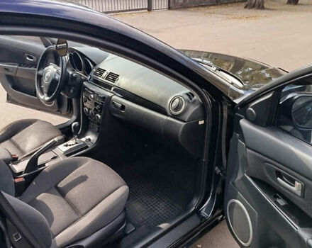 Черный Мазда 3, объемом двигателя 2 л и пробегом 199 тыс. км за 6800 $, фото 10 на Automoto.ua