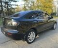 Черный Мазда 3, объемом двигателя 2 л и пробегом 192 тыс. км за 6500 $, фото 4 на Automoto.ua