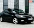 Черный Мазда 3, объемом двигателя 2 л и пробегом 185 тыс. км за 5999 $, фото 1 на Automoto.ua