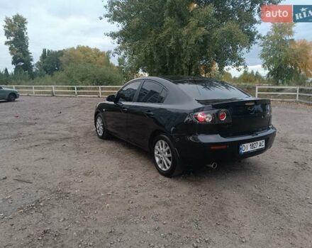 Черный Мазда 3, объемом двигателя 2 л и пробегом 221 тыс. км за 5700 $, фото 5 на Automoto.ua
