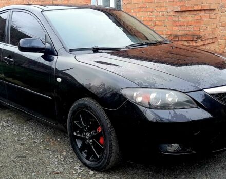 Черный Мазда 3, объемом двигателя 1.6 л и пробегом 260 тыс. км за 4100 $, фото 1 на Automoto.ua