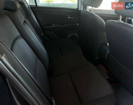 Чорний Мазда 3, об'ємом двигуна 1.6 л та пробігом 150 тис. км за 6299 $, фото 12 на Automoto.ua