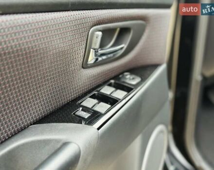 Черный Мазда 3, объемом двигателя 1.6 л и пробегом 130 тыс. км за 7700 $, фото 39 на Automoto.ua