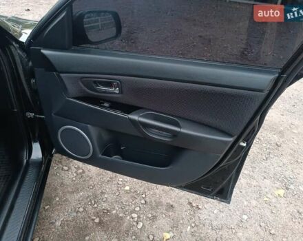 Черный Мазда 3, объемом двигателя 2 л и пробегом 221 тыс. км за 5700 $, фото 23 на Automoto.ua