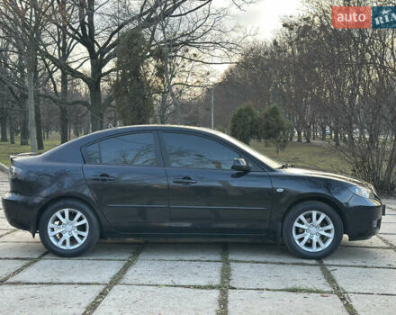 Чорний Мазда 3, об'ємом двигуна 1.6 л та пробігом 198 тис. км за 5499 $, фото 10 на Automoto.ua