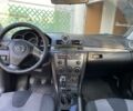 Черный Мазда 3, объемом двигателя 2 л и пробегом 246 тыс. км за 5800 $, фото 5 на Automoto.ua