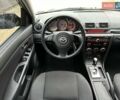Чорний Мазда 3, об'ємом двигуна 1.6 л та пробігом 130 тис. км за 6999 $, фото 28 на Automoto.ua
