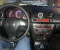 Черный Мазда 3, объемом двигателя 2 л и пробегом 246 тыс. км за 5800 $, фото 8 на Automoto.ua