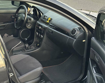 Черный Мазда 3, объемом двигателя 1.6 л и пробегом 225 тыс. км за 5900 $, фото 11 на Automoto.ua