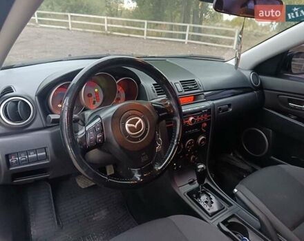 Черный Мазда 3, объемом двигателя 2 л и пробегом 221 тыс. км за 5700 $, фото 16 на Automoto.ua