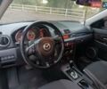 Черный Мазда 3, объемом двигателя 2 л и пробегом 221 тыс. км за 5700 $, фото 16 на Automoto.ua