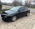 Черный Мазда 3, объемом двигателя 2 л и пробегом 216 тыс. км за 3800 $, фото 1 на Automoto.ua