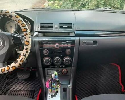 Черный Мазда 3, объемом двигателя 2 л и пробегом 187 тыс. км за 6400 $, фото 5 на Automoto.ua