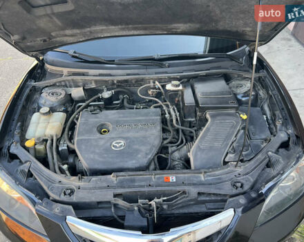 Чорний Мазда 3, об'ємом двигуна 2 л та пробігом 167 тис. км за 7500 $, фото 17 на Automoto.ua