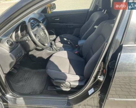 Черный Мазда 3, объемом двигателя 2 л и пробегом 175 тыс. км за 6000 $, фото 9 на Automoto.ua