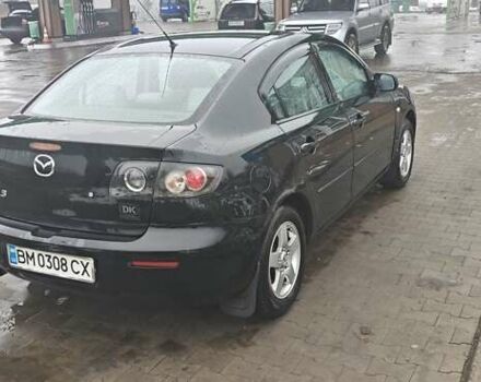 Черный Мазда 3, объемом двигателя 1.6 л и пробегом 205 тыс. км за 5600 $, фото 7 на Automoto.ua