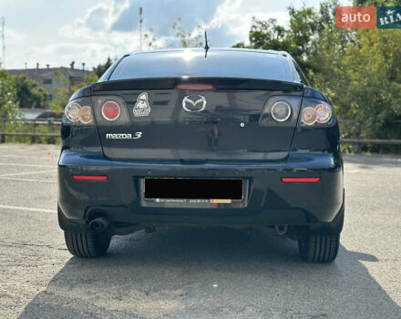 Чорний Мазда 3, об'ємом двигуна 1.6 л та пробігом 183 тис. км за 6500 $, фото 4 на Automoto.ua