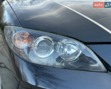 Чорний Мазда 3, об'ємом двигуна 1.6 л та пробігом 198 тис. км за 5499 $, фото 28 на Automoto.ua