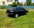 Черный Мазда 3, объемом двигателя 2 л и пробегом 245 тыс. км за 4450 $, фото 3 на Automoto.ua