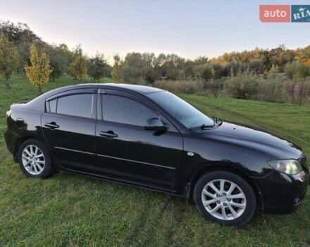 Чорний Мазда 3, об'ємом двигуна 1.6 л та пробігом 253 тис. км за 5200 $, фото 7 на Automoto.ua