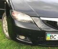 Чорний Мазда 3, об'ємом двигуна 1.6 л та пробігом 260 тис. км за 5950 $, фото 4 на Automoto.ua